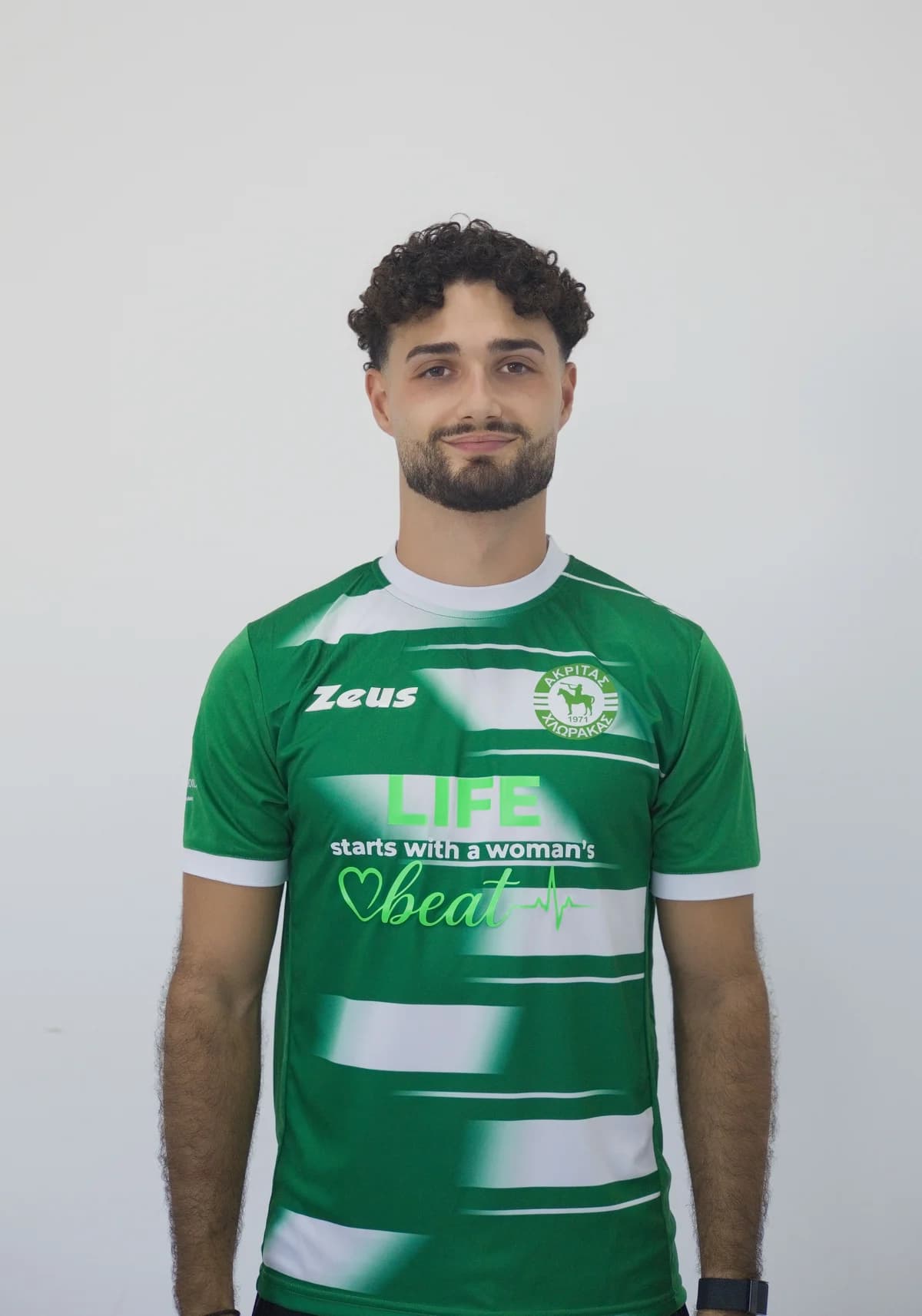Michael Dellios wearing the Akritas Chlorakas home shirt