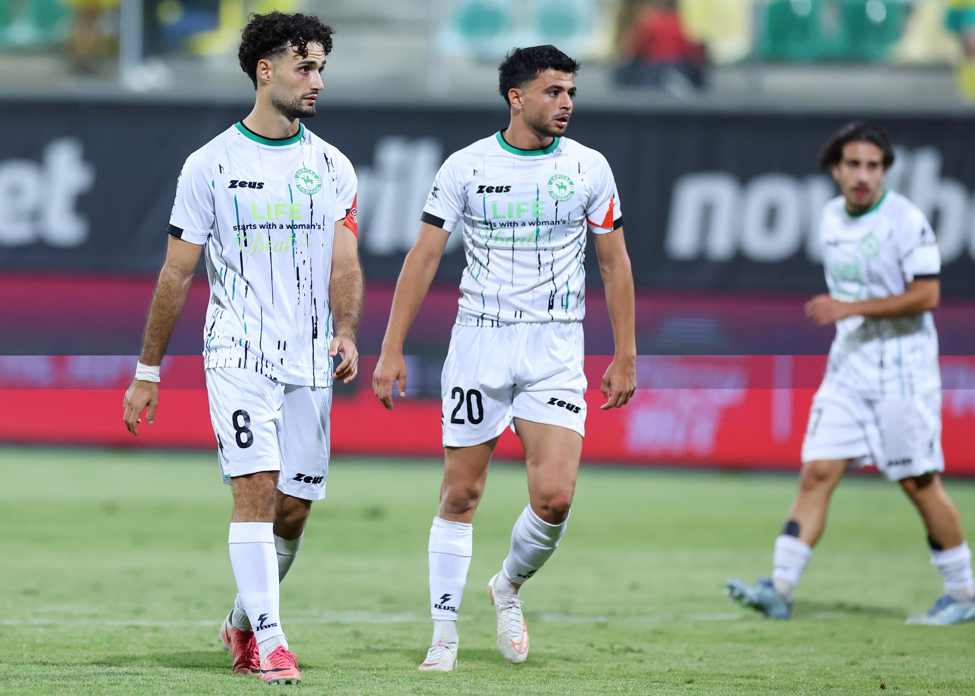 Akritas players come together after a moment in the match